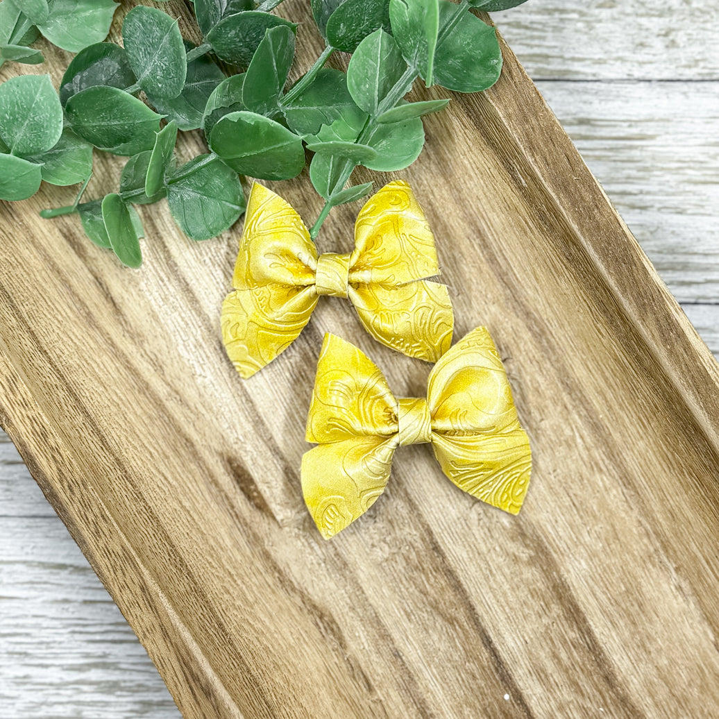 Pastel Yellow Embossed Itty Bitty Piggies